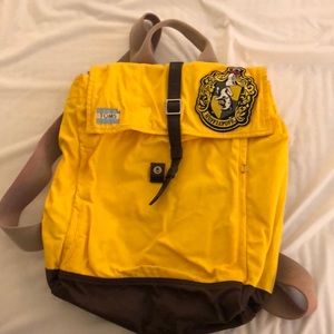 TOMS yellow backpack with Hufflepuff patch